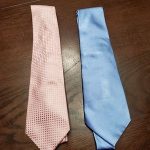 Set of 2 mens Donald Trump ties.100 % silk. 1 pink in color. 1 light blue in col